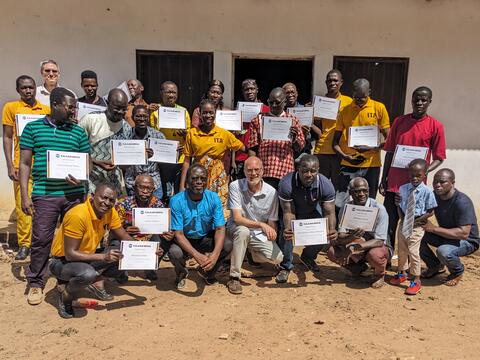 Group photo with certificates