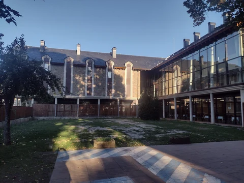 View of guest house bedrooms and dining hall from the courtyard