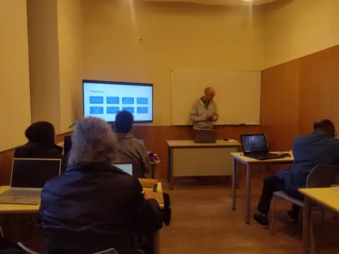 Outlining workshop goals at the opening session