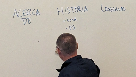 David writing instructions on the whiteboard