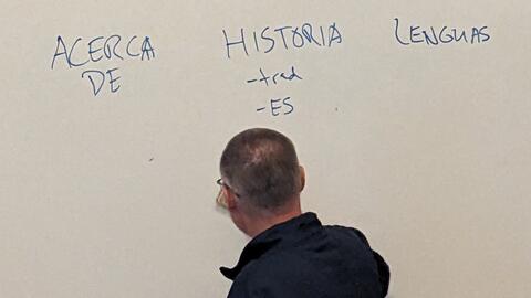 David writing instructions on the whiteboard