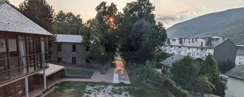 Sunrise view across the guest house courtyard to the training centre