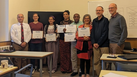 Group photo with certificates