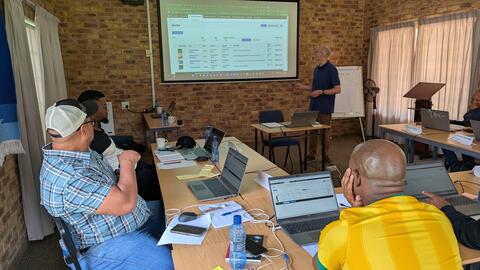 John teaching how to upload images to Media Library