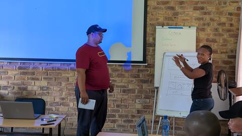 sePulana team explains their Home page wireframe to the group