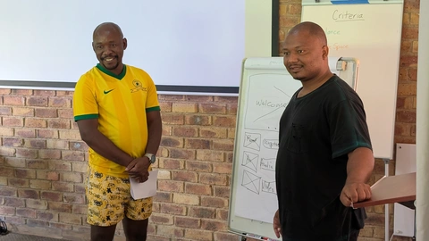 seSotho team explains their Home page wireframe to the group