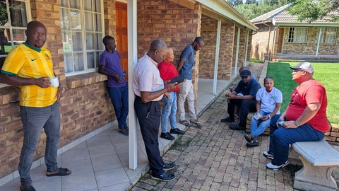 Students take a nervous break before presenting their sites