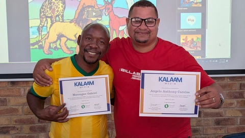 Students proudly showing certificates 