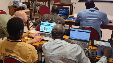 John helps the Karon (Senegal) team