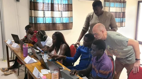 John helping the Bandial trainee, who arrived on Day 3