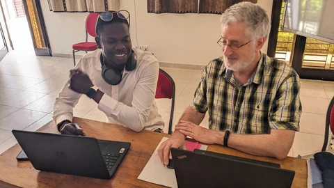 Dan working with the Wolof trainee