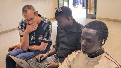 Visiting mission partner Jonathan getting to know the Wolof trainee