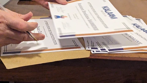 Signing certificates on Thursday evening