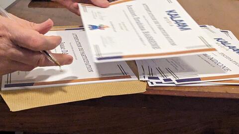 Signing certificates on Thursday evening