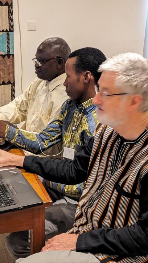 Dan helps the Manjac team before the celebration