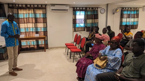 DPTLL president François Bagne addresses guests at the celebration