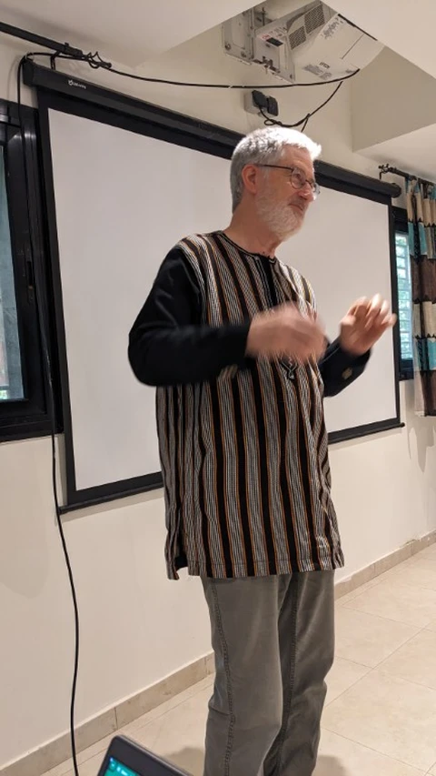 Dan addresses guests at the celebration