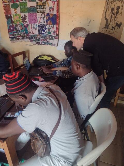 Christoph helping students