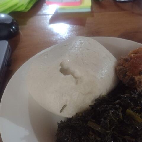 Fufu with greens and chicken