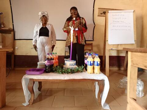 Lighting the candle on the celebration cake