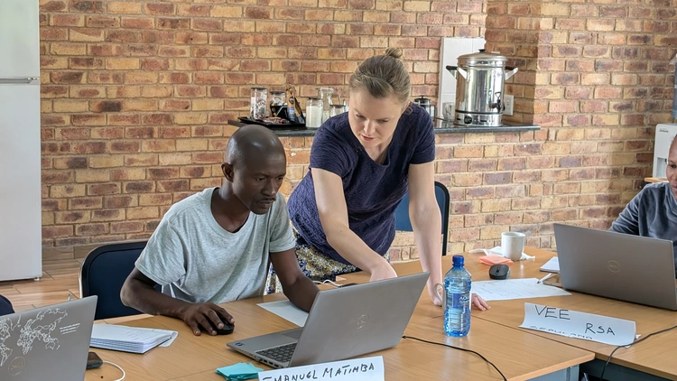 Emilee provides coaching for Manuel